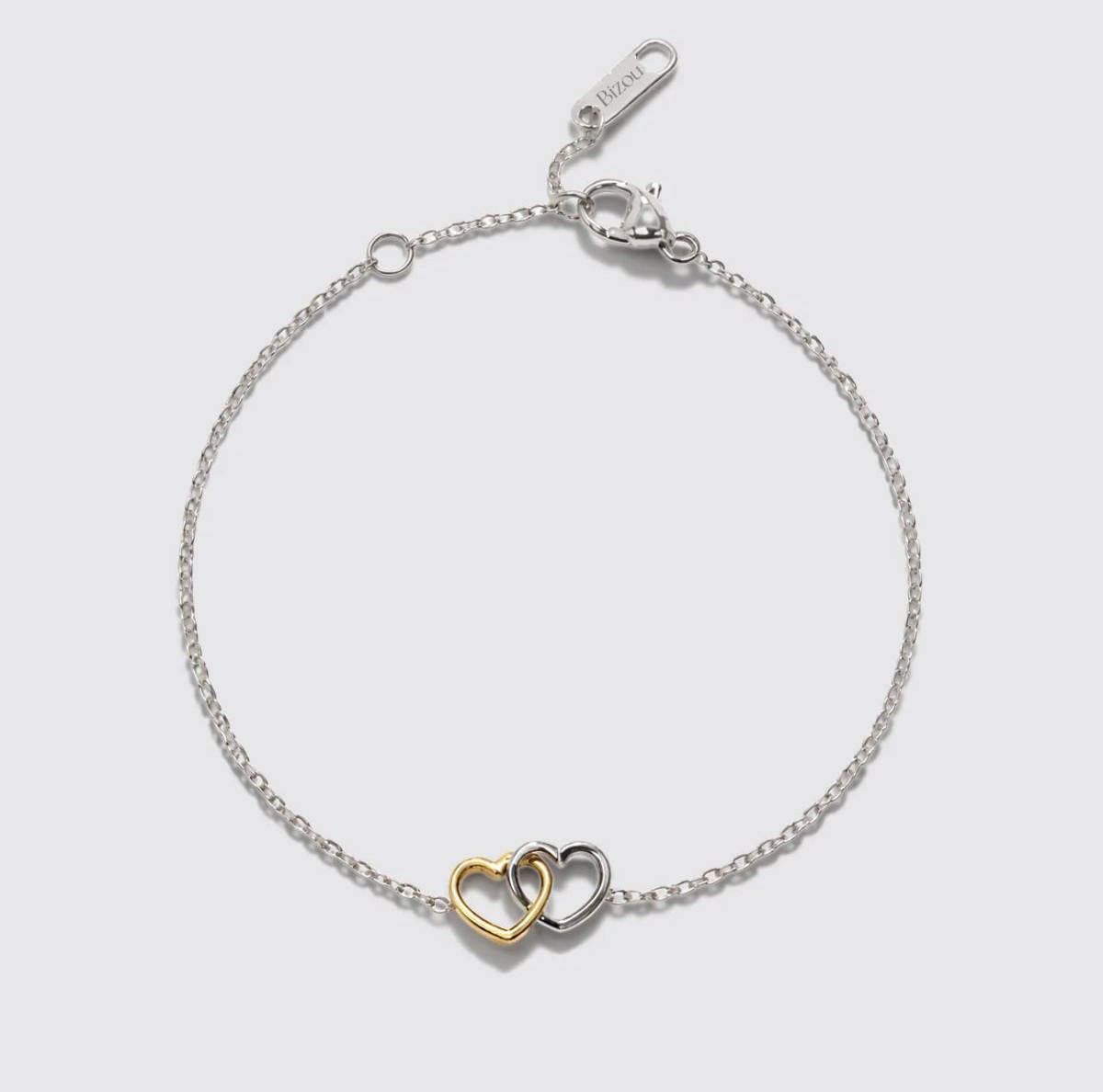 Bracelet argenté en acier inoxydable avec cœurs bicolores Bizou