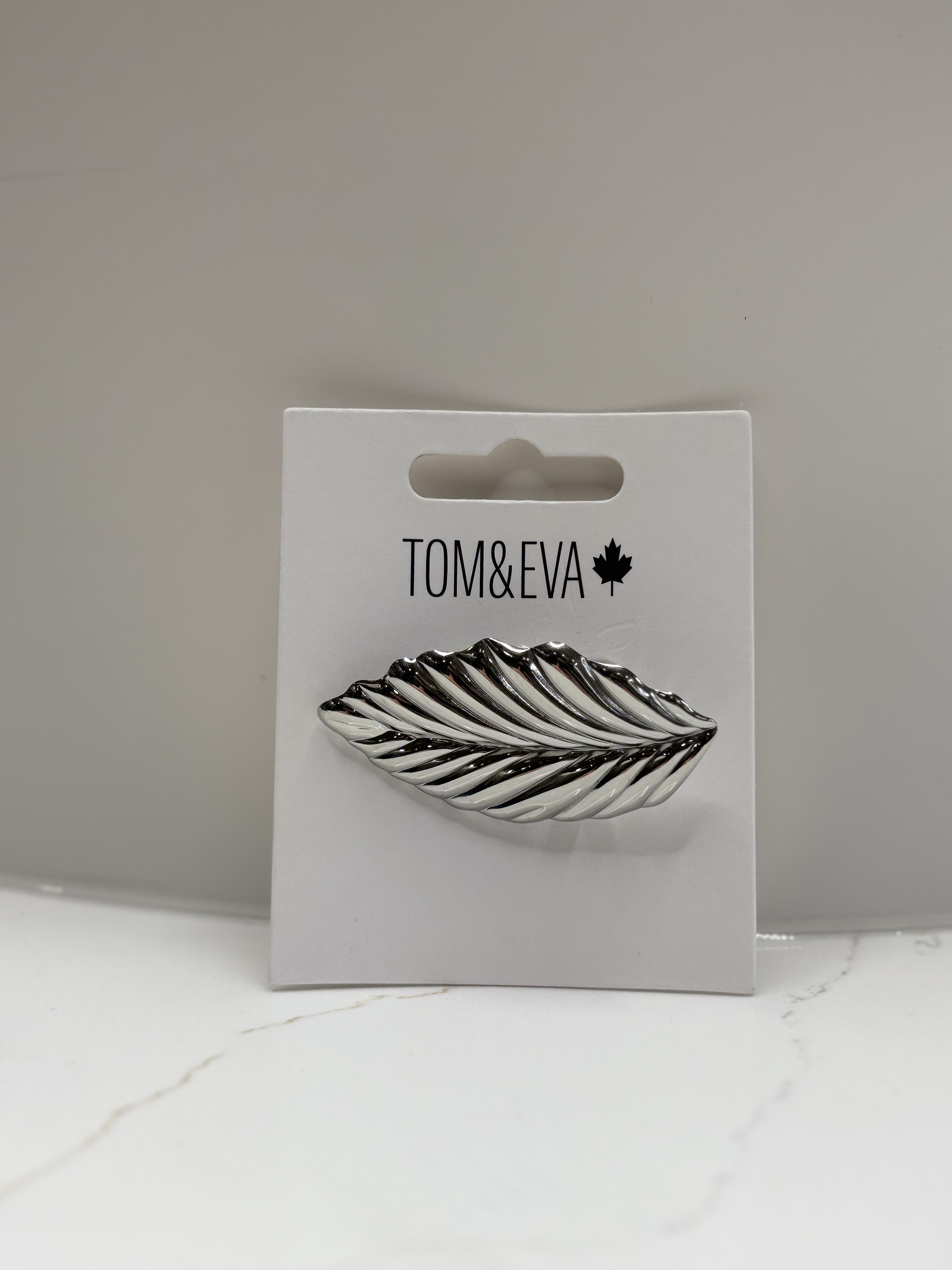Broche en plume Tom & Eva 