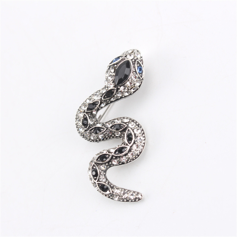 Broche serpent en alliage de zinc avec strass et émail