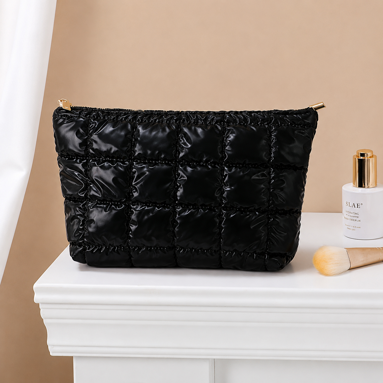 Trousse de voyage style puffer