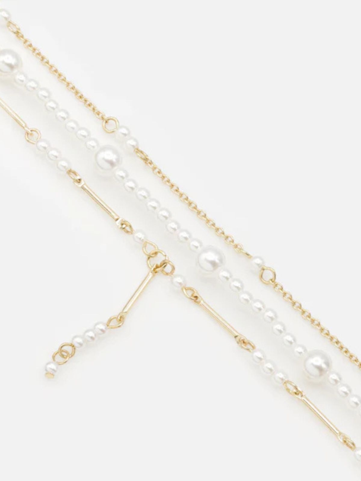 Trio de bracelets dorés avec perles Bizou
